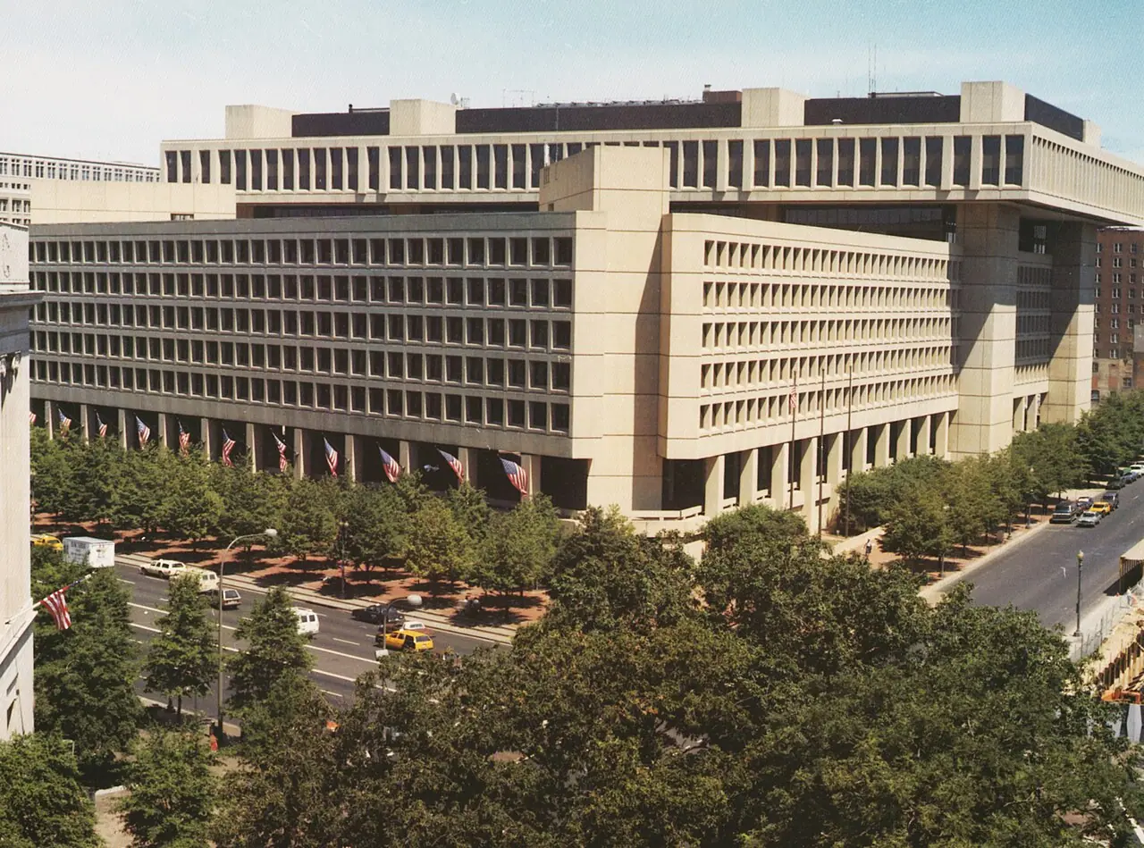J. Edgar Hoover Building, FBI headquarters, Washington, D.C. (FBI photograph on Wikimedia Commons, public domain in the United States)—institutional backdrop for scrutiny of FBI leadership travel and aviation logistics; not Director Patel, a tail number cited in the story, or the Philadelphia concert venue.